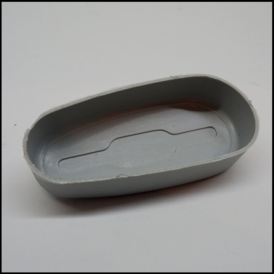 Base oval cinzenta em plástico com bordas irregulares