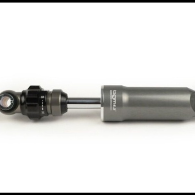 Amortecedor de bicicleta cinzento com detalhes pretos sobre fundo branco