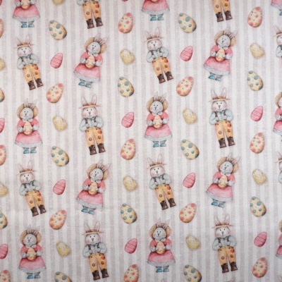 Tecido com padrão de coelhinhos e ovos de Páscoa coloridos