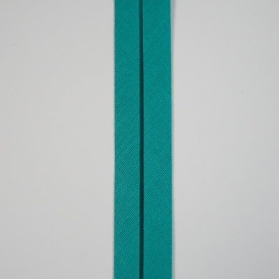 Fita de tecido azul turquesa com linha preta ao centro