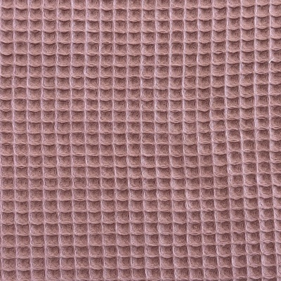 Tecido rosa antigo com textura em padrão waffle