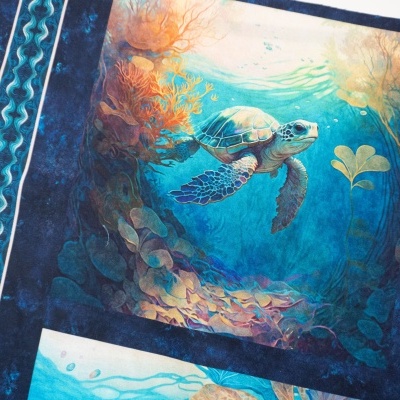 Pano ou manta com estampa de tartaruga marinha em tons azuis e laranja