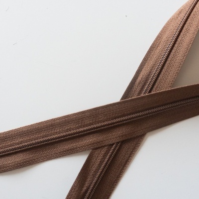 Fechos éclair castanhos com dentes metálicos