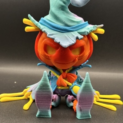 Figura decorativa de abóbora com chapéu de feiticeiro colorido