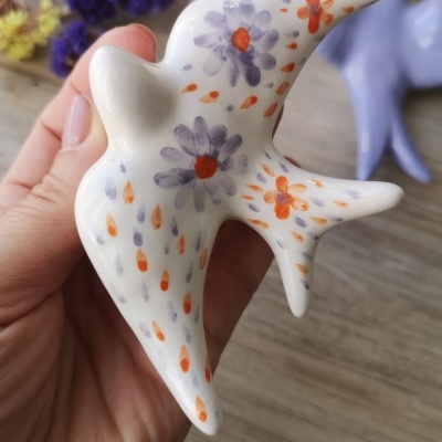 Conjunto de 2 andorinhas em cerâmica