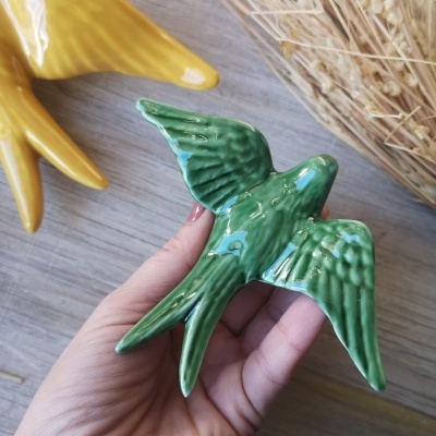 Conjunto de 4 andorinhas em cerâmica com padrão floral