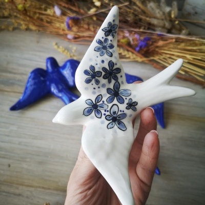 Conjunto de 4 andorinhas em cerâmica em azul cobalto