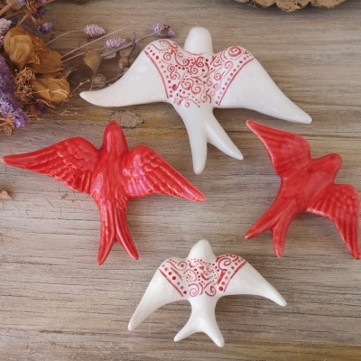 Conjunto de 4 andorinhas em cerâmica