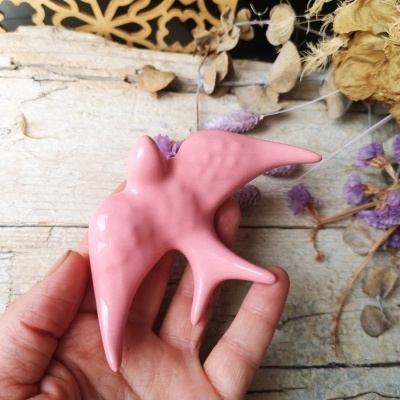 Conjunto de 2 andorinhas em cerâmica