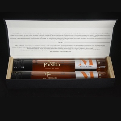 Conjunto de tubos com mel da marca Palmelia em caixa preta com texto informativo no interior da tampa.