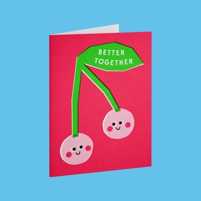 Cartão cor de rosa com duas cerejas e texto BETTER TOGETHER