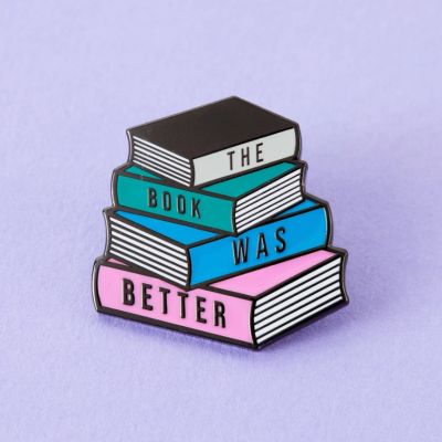 Pin em forma de quatro livros empilhados com as palavras THE BOOK WAS BETTER
