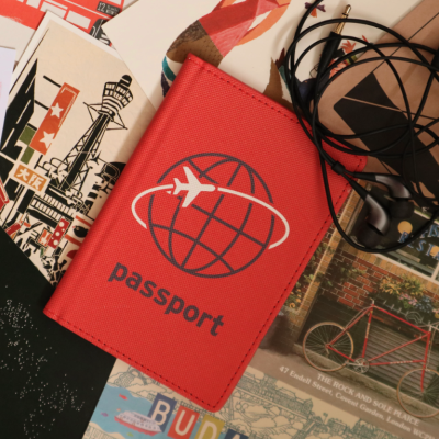 "RED JET SET PASSPORT CASE" KIKKERLAND