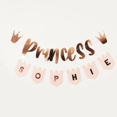 Faixas decorativas com as palavras PRINCESS e SOPHIE em rosa dourado e rosa claro