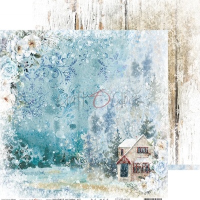 Papel de embrulho azul com casa nevada e flores brancas sobre madeira clara