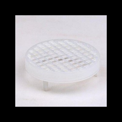 Plástico circular branco com superfície quadriculada e pés de apoio