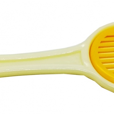 Cortador de ovos de plástico branco com lâmina amarela