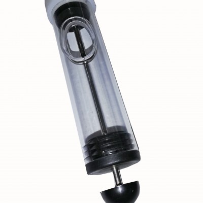 Tubo cilíndrico transparente com tampa branca e base preta