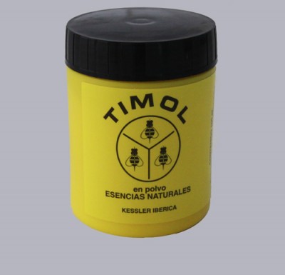 Frasco amarelo com tampa preta marcado com TIMOL en polvo ESENCIAS NATURALES KESSLER IBERICA