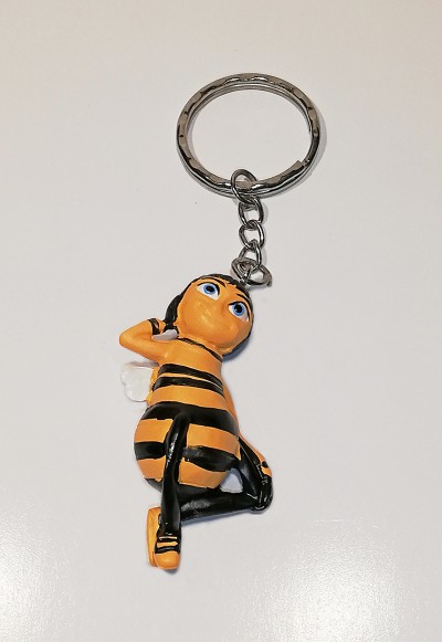 Chaveiro de abelha em plástico amarelo e preto com anilha metálica