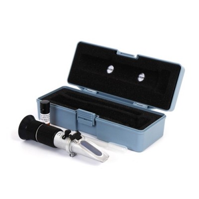 Instrumento de vidro e metal com frasco e estojo azul claro aberto