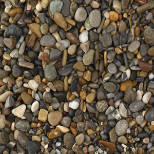 Pequenas pedras decorativas coloridas variando em cinza, branco, castanho e bege