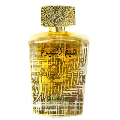 Frasco de perfume dourado com tampa texturizada e texto em árabe e inglês