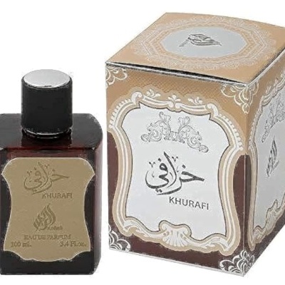 Frasco de perfume castanho com caixa bege decorada