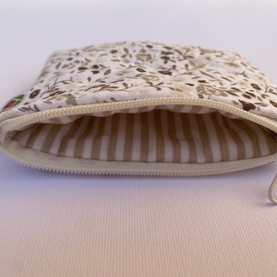 BOLSINHA FLORAL BEGE