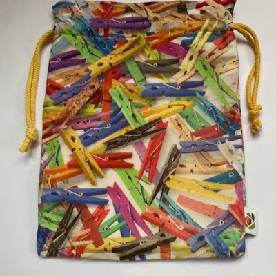 SACO MOLAS DE ROUPA AMARELO