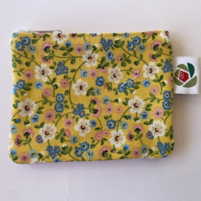 BOLSINHA AMARELA FLORAL ESTAMPADA