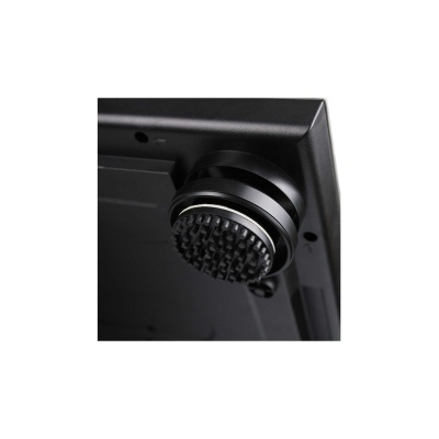 Suporte preto circular com textura numa base preta