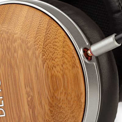 Headphones with wooden ear cups and black leather padding