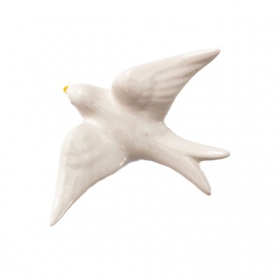 Figura decorativa de pássaro branco em cerâmica com bico amarelo