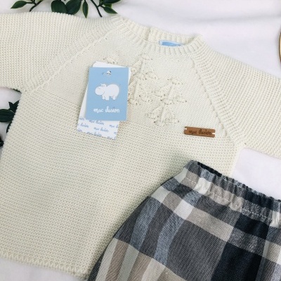 conjunto de calção, camisola e gorro