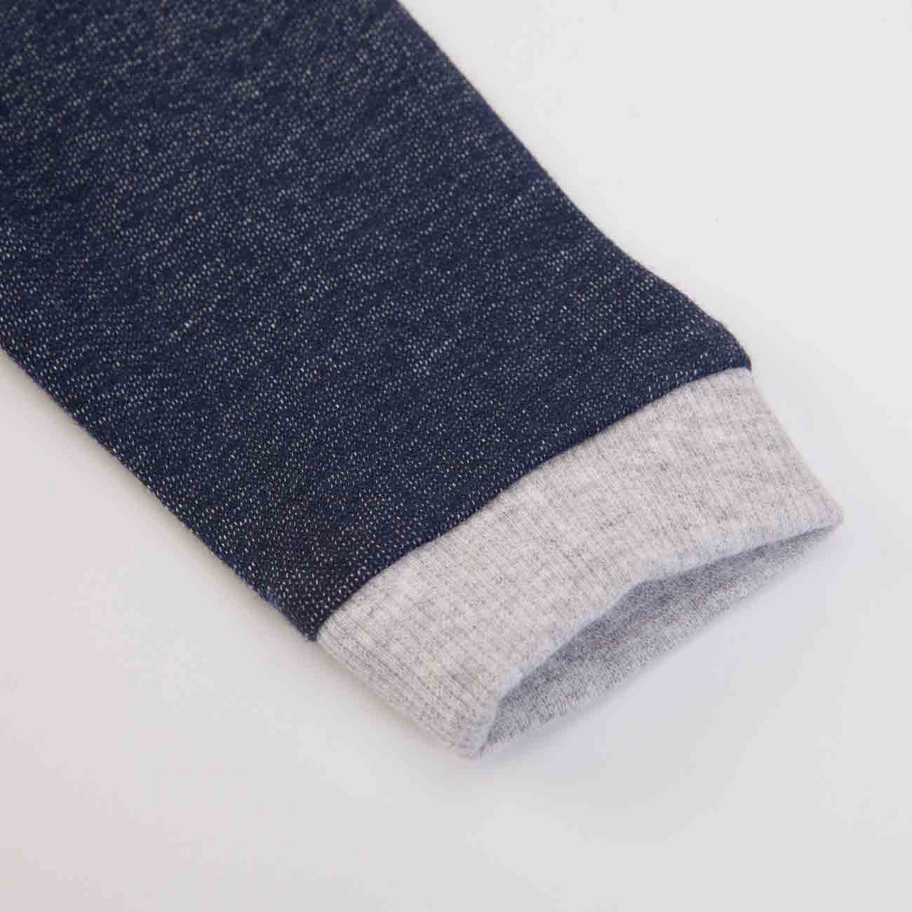 Manga comprida azul escuro com punho cinza claro