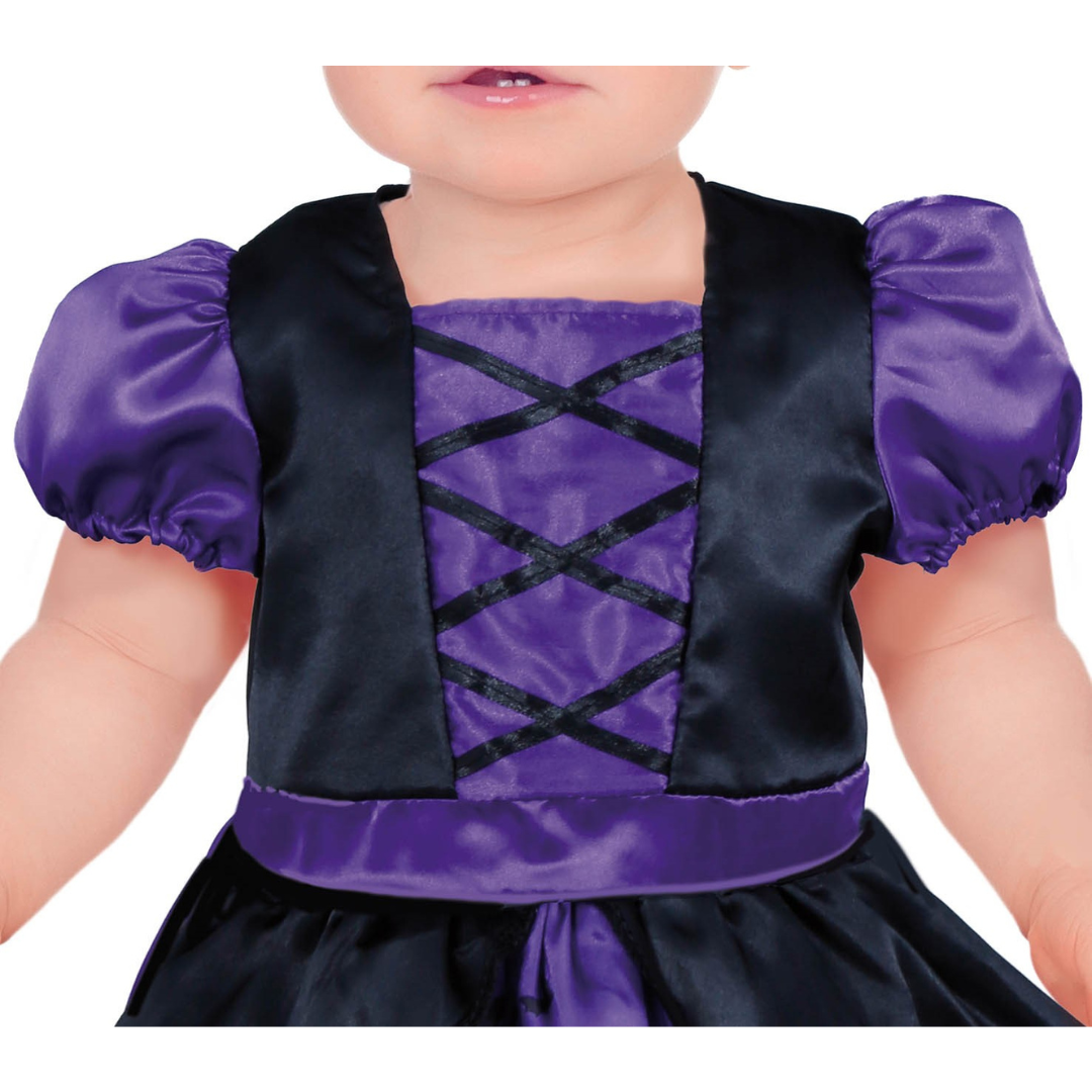 Vestido infantil preto e roxo com mangas almofadadas e laços no corpete