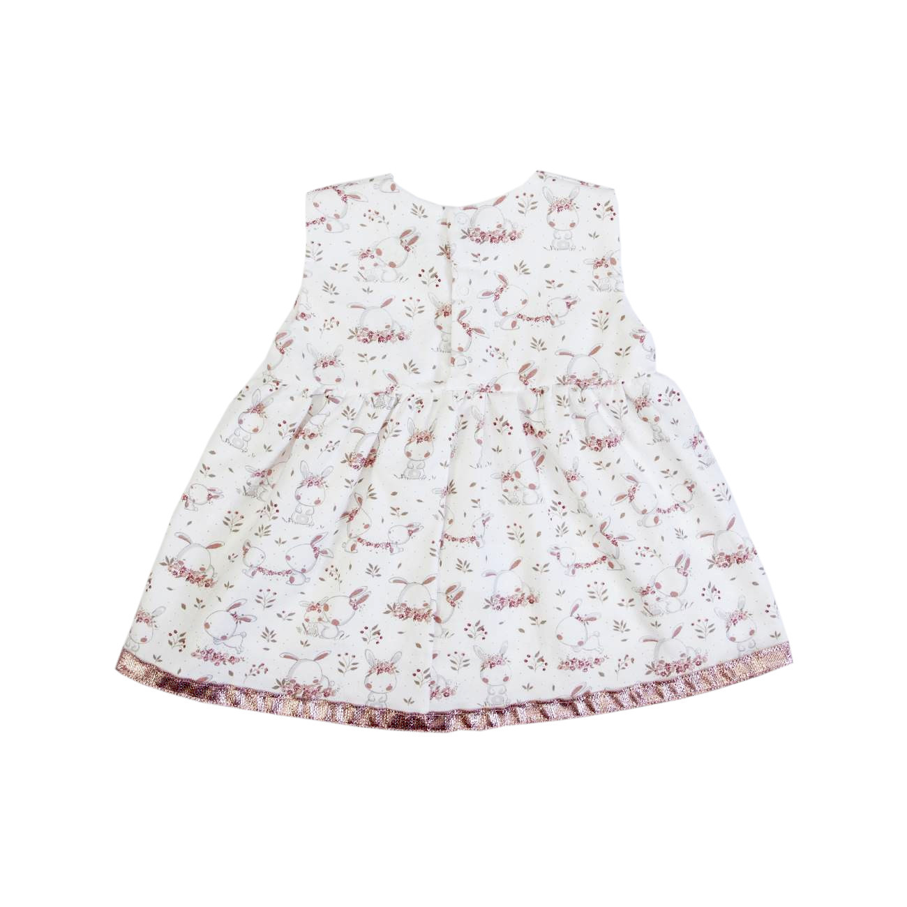 Vestido branco de menina com padrão floral e folho cor-de-rosa
