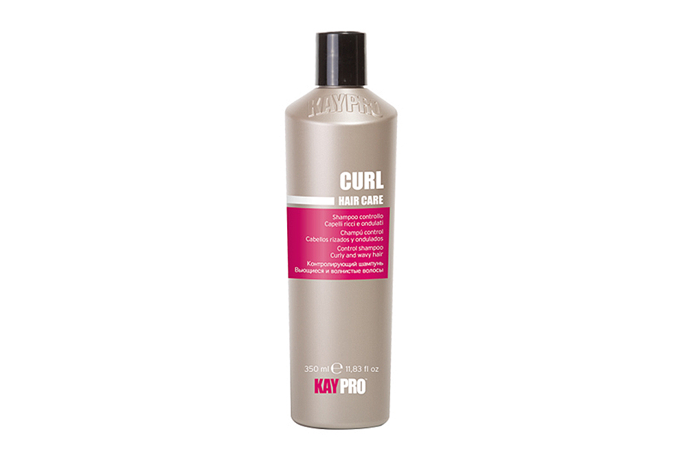 Frasco cinza claro com tampa preta e etiqueta rosa de produto para cabelo