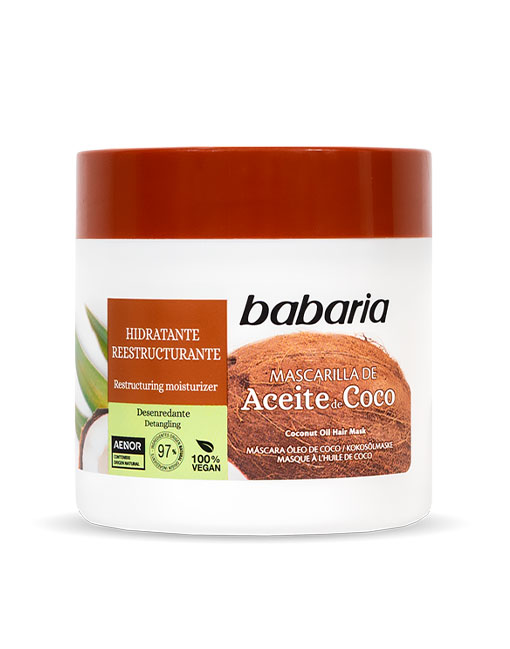 Frasco branco com tampa castanha de creme para cabelo Babaria com rótulo e imagem de coco