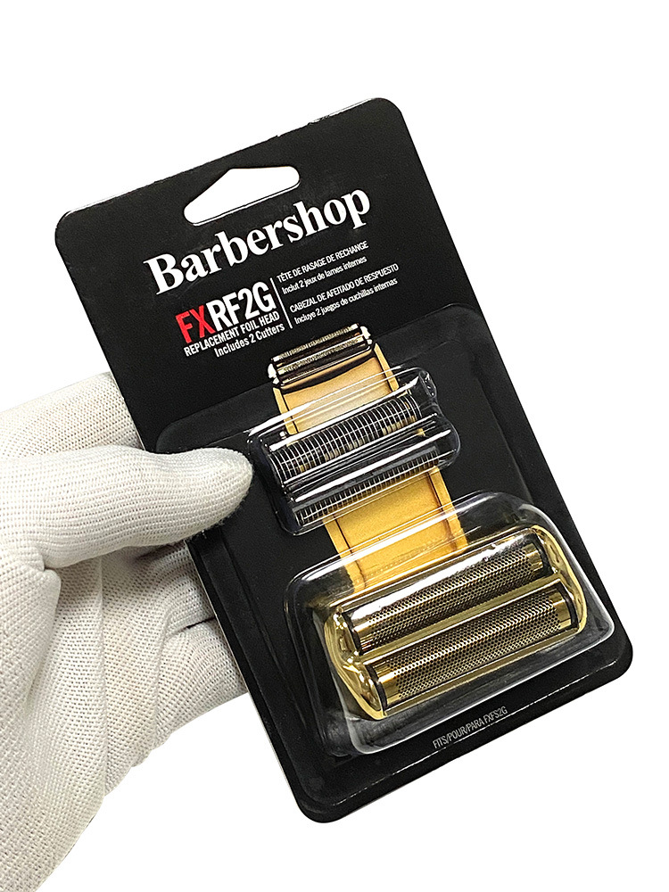 Substituição de lâminas para barbeador Barbershop em embalagem preta, mostrando duas lâminas douradas.