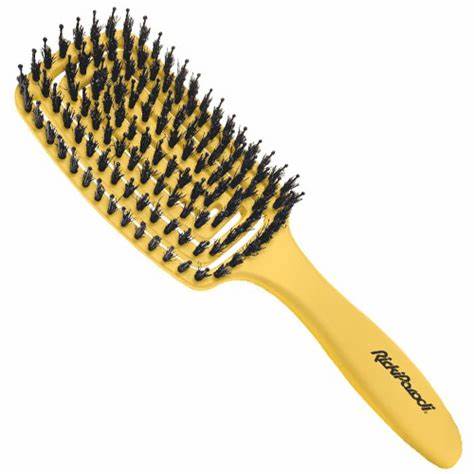 Escova de cabelo amarela com cerdas pretas e texto 'ROSEWOOD' no cabo