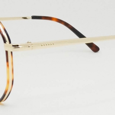 Óculos de grau com armação redonda padrão tartaruga castanho e dourado