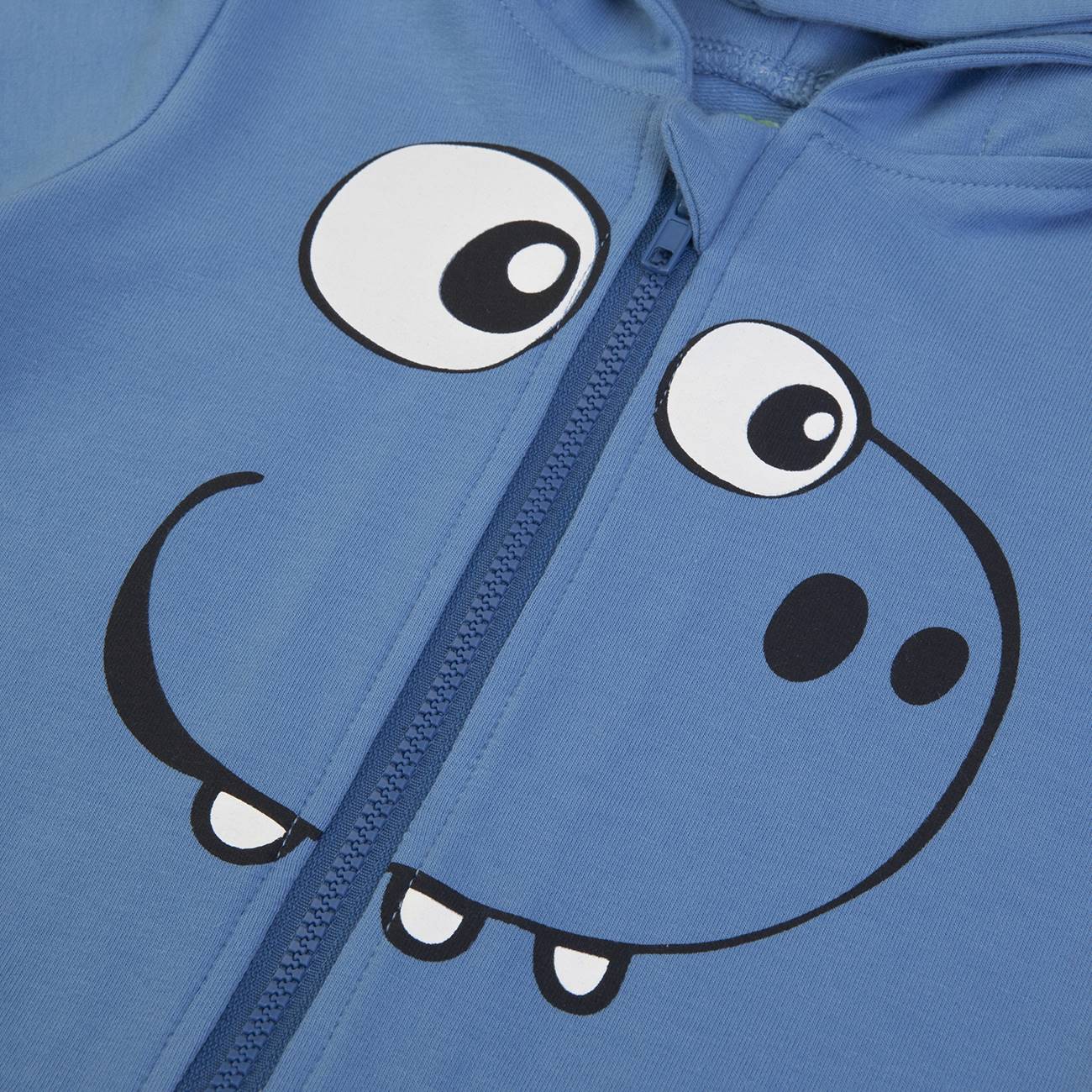 Capa azul com estampa de cara sorridente e fecho de correr