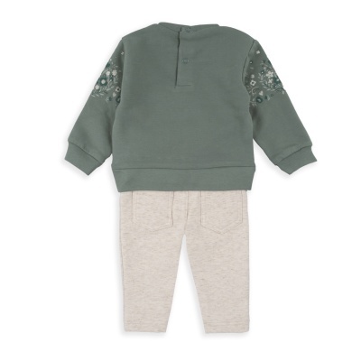 Conjunto infantil verde com estampado floral e calças bege