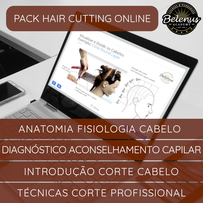 Pack Pro Quad: Profissional em Barbearia & Cabeleireiro Portátil com curso online de corte de cabelo numa mesa branca com telemóvel e teclado