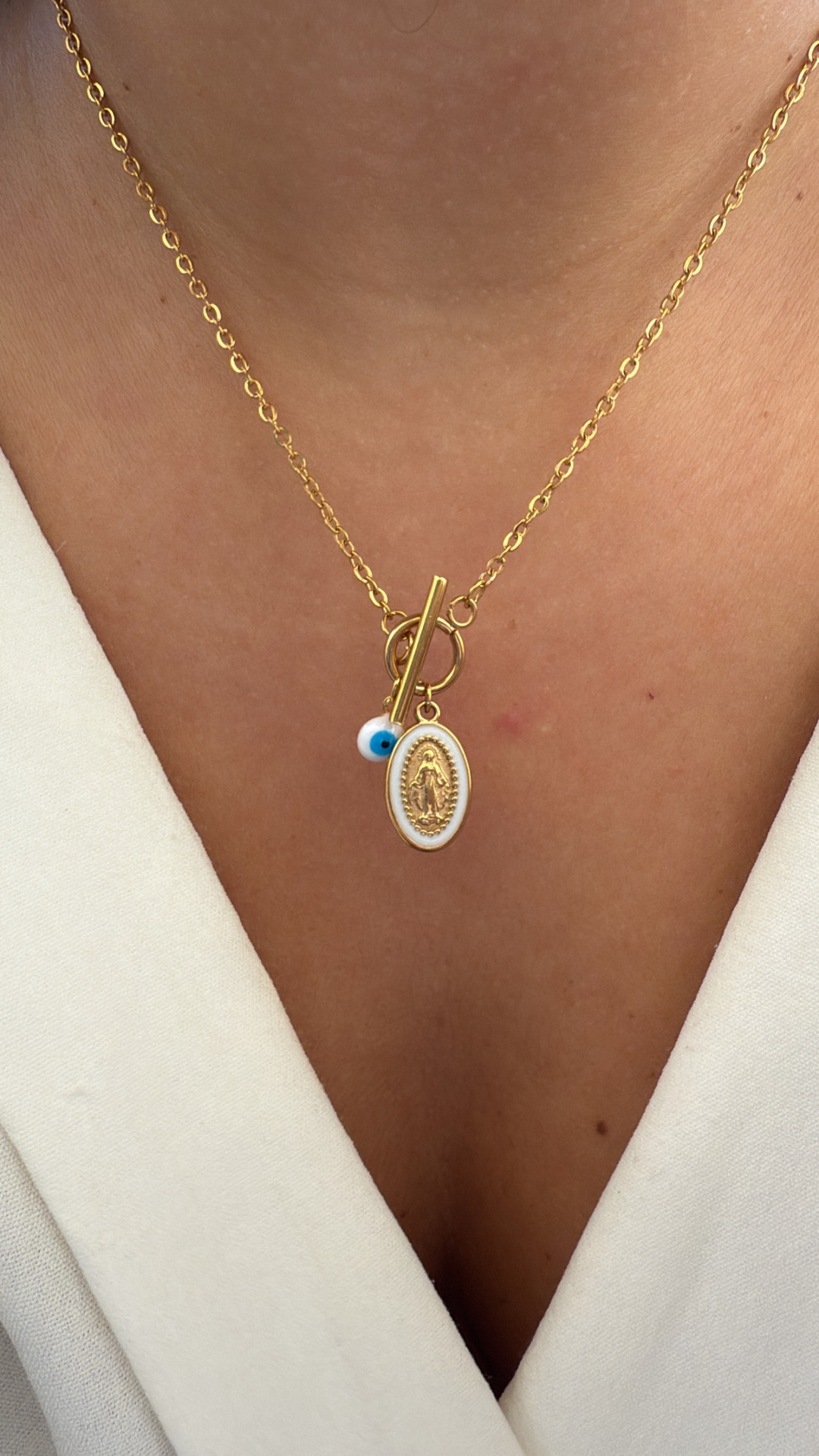 Colar nossa senhora e olho da sorte