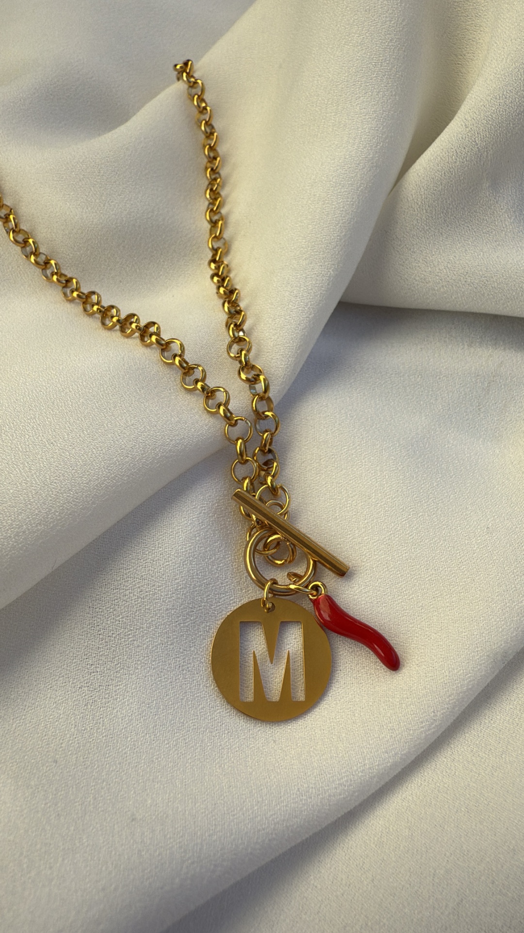 Colar inicial e malagueta