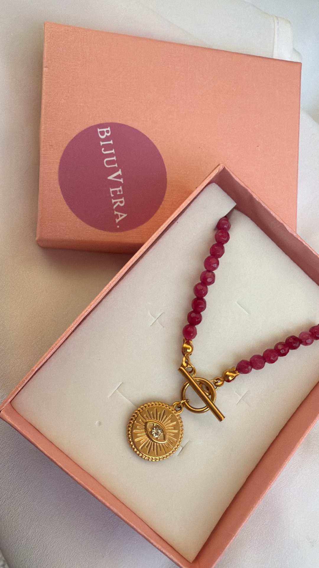 Colar pedrinhas com olho da sorte