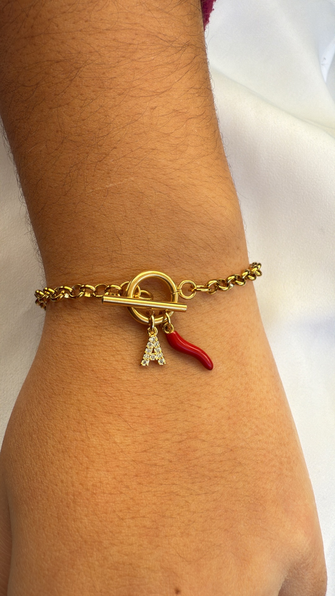 Pulseira letra e pimenta